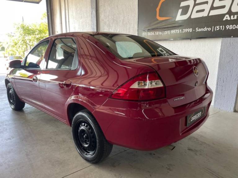 CHEVROLET - PRISMA - 2010/2010 - Vermelha - R$ 28.900,00